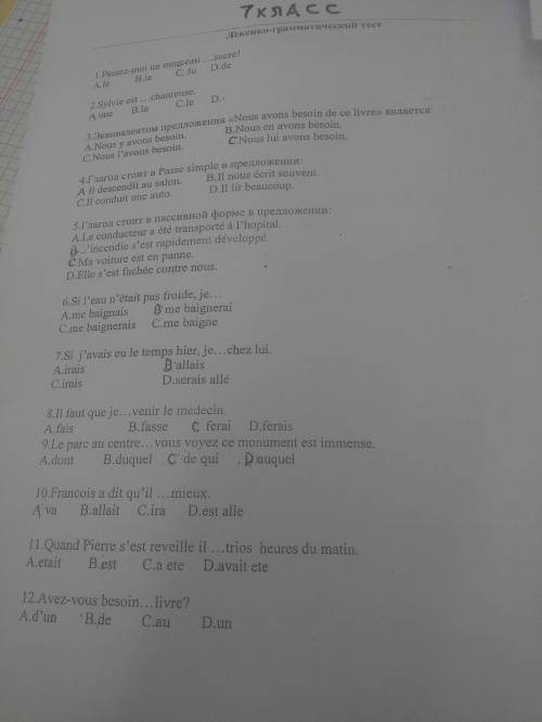 1)passez-moi un morceasucre A. Le b.la c.du d.de 2)Sylvie est Chanteuse A.une b. La c. Le d. -