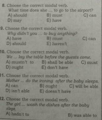 Choose the correct modal verb ​