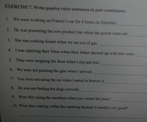 Write passive voice sentences in past continuous​