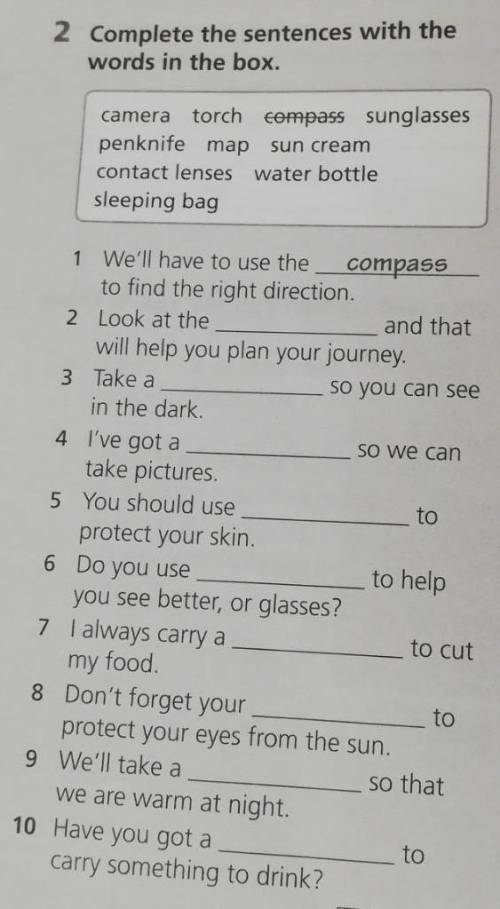 2 Complete the sentences with the words in the box.camera torch cornpes Sunglassespenknife map sun c